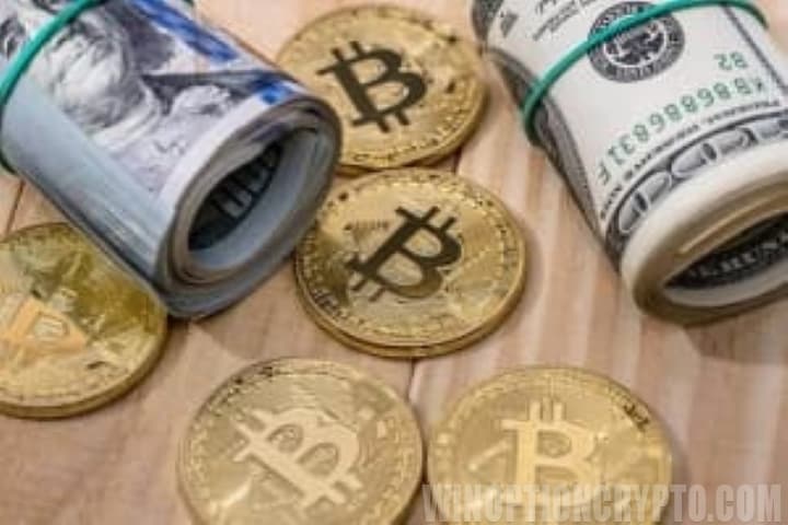 Bitcoins in the form of physical coins and dollars